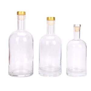 Clear vodka bottle with corks