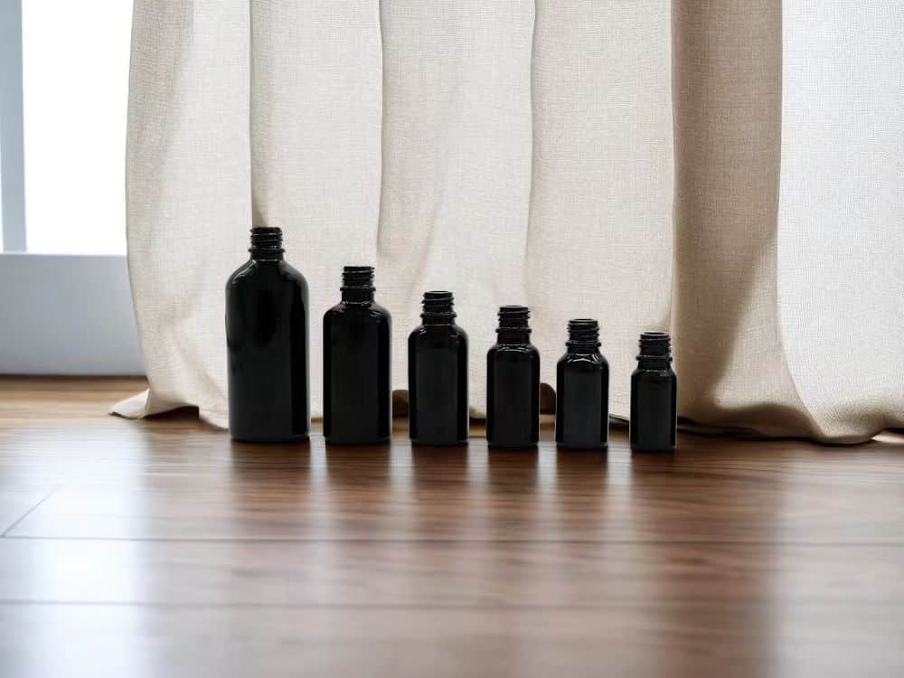 black glass essential oil bottles