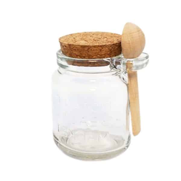 Glass bath salt with cork and spoon