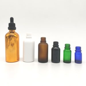 different colors of essential oil bottles